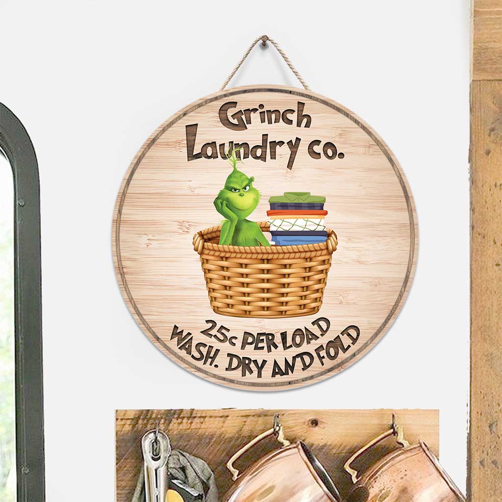 Laundry Co - Panneau rond en bois « Noël volé »