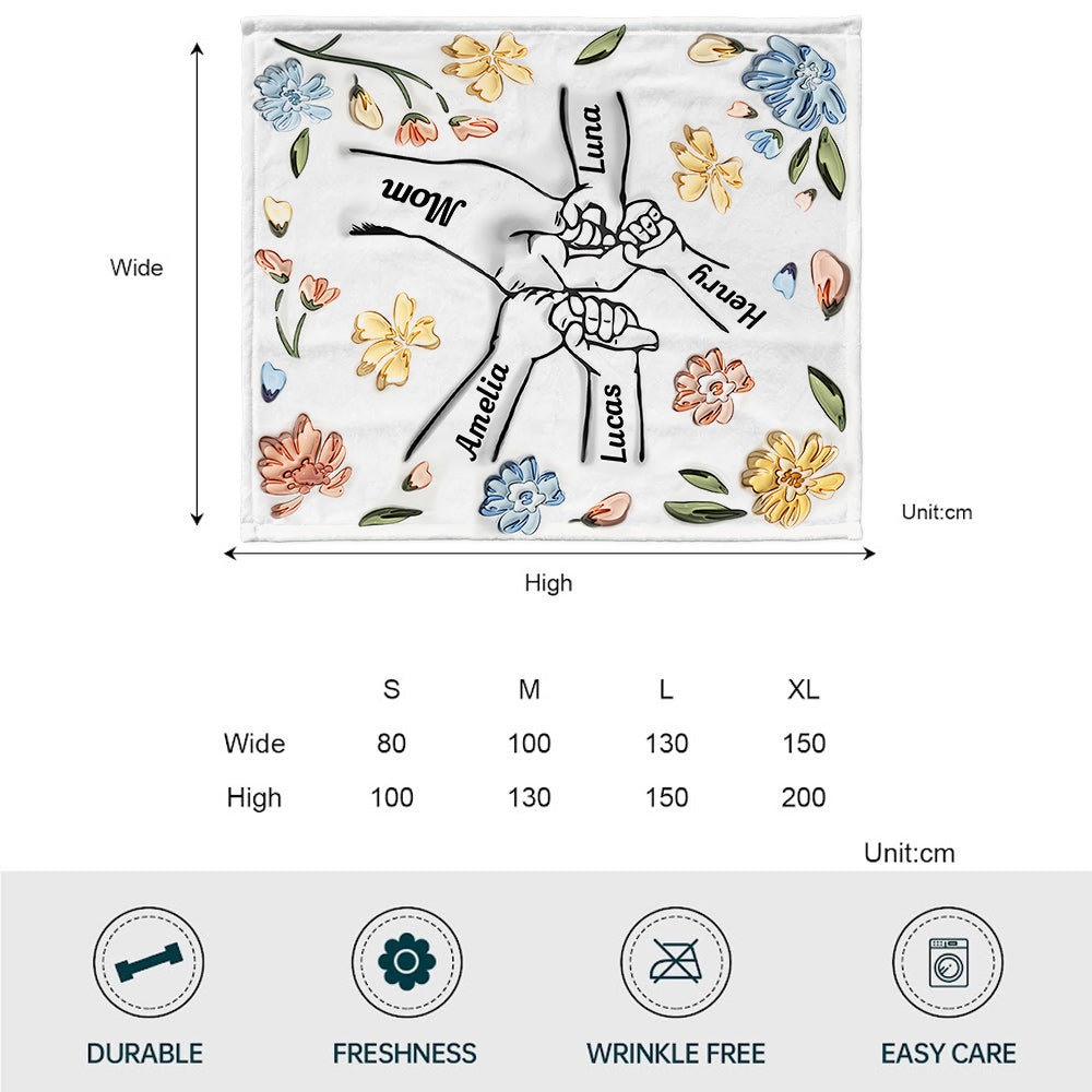 Couverture personnalisée « Mains aimantes de maman tenant des fleurs pastel »
